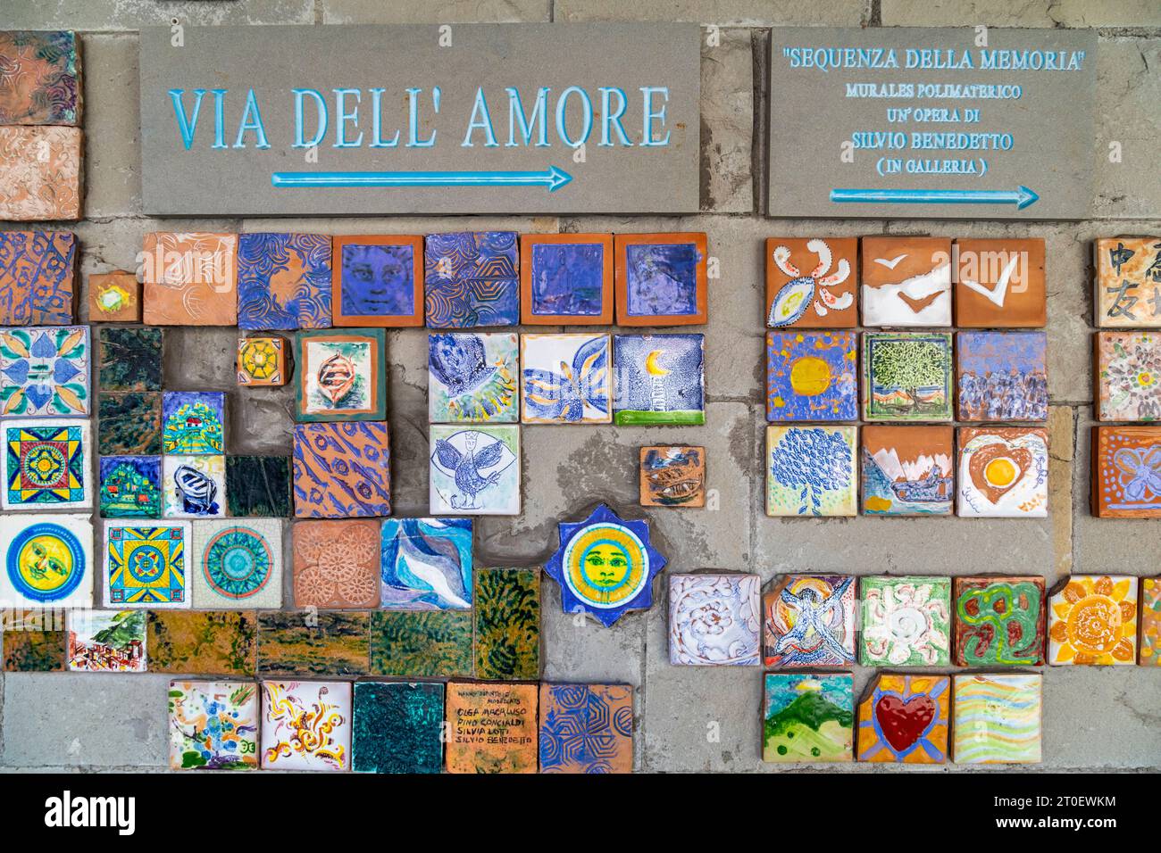 Italy, Liguria, province of La Spezia, Cinque Terre, artistic installation of decorated and colorful tiles at the entrance to the Via dell'Amore in Riomaggiore Stock Photo