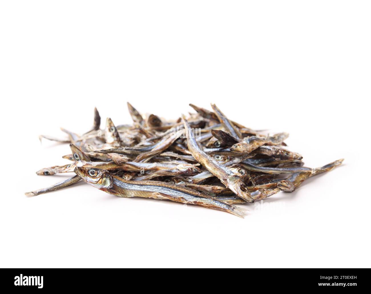 Pile of dried sardines for dogs and cats for treats. Many dehydrated fishes in multiple sizes. Healthy dog snack or health supplement rich on protein, Stock Photo