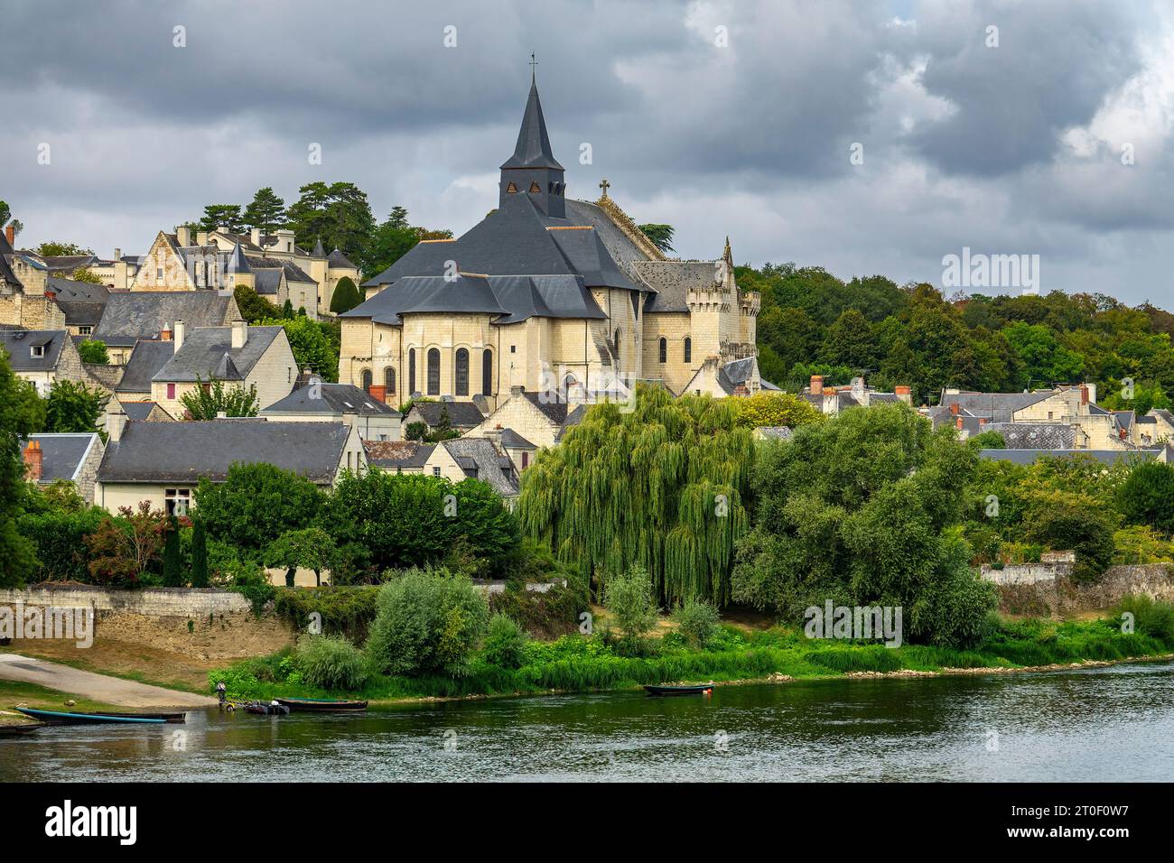 View over the Vienne near Candes-Saint-Martin to the pilgrimage church St. Martin. The municipality of Candes-Saint-Martin is located directly at the mouth of the Vienne into the Loire. Stock Photo