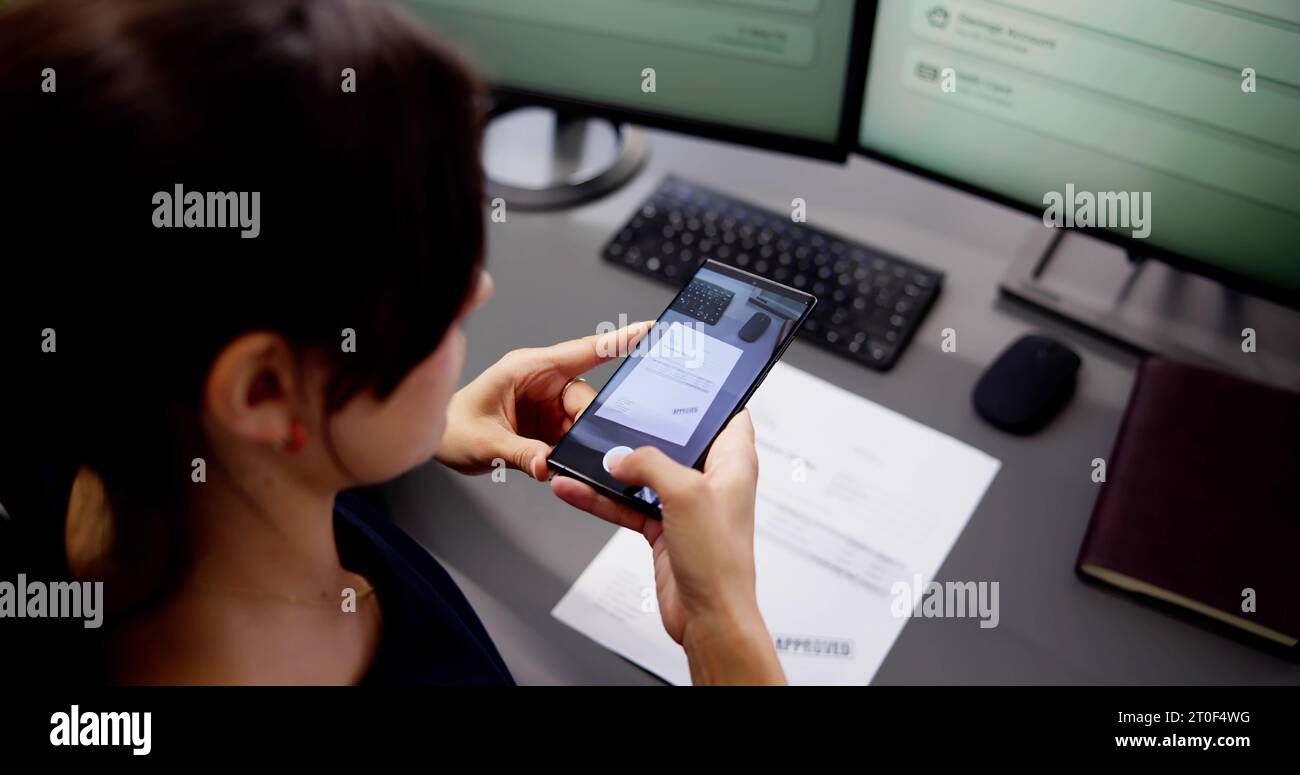 Taking Document Picture Or Photo With Phone. Smartphone Optical Document Stock Photo