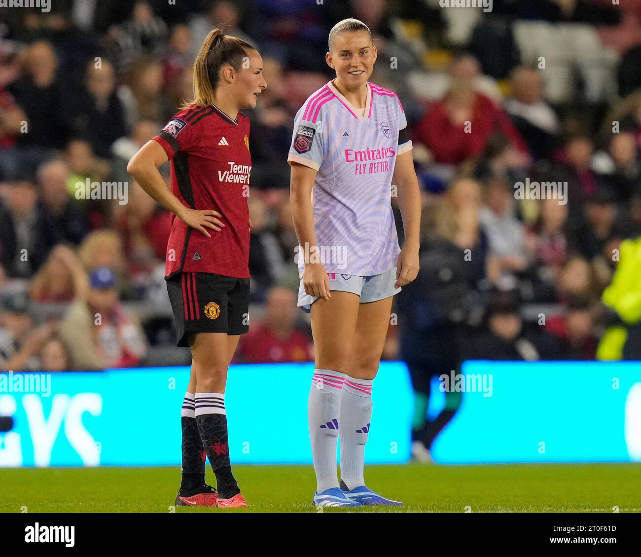 Ella Toone #7 of Manchester United jokes with former team mate Alessia Russo #23 of Arsenal Women during the The FA Women's Super League match Manchester United Women vs Arsenal Women at Leigh Sports Village, Leigh, United Kingdom, 6th October 2023  (Photo by Steve Flynn/News Images) Stock Photo