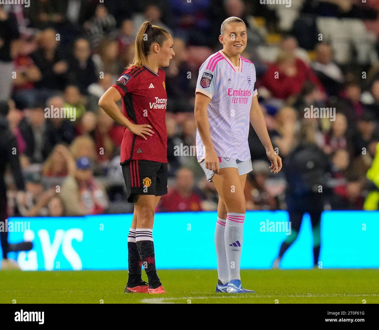 Ella Toone #7 of Manchester United jokes with former team mate Alessia Russo #23 of Arsenal Women during the The FA Women's Super League match Manchester United Women vs Arsenal Women at Leigh Sports Village, Leigh, United Kingdom, 6th October 2023  (Photo by Steve Flynn/News Images) Stock Photo