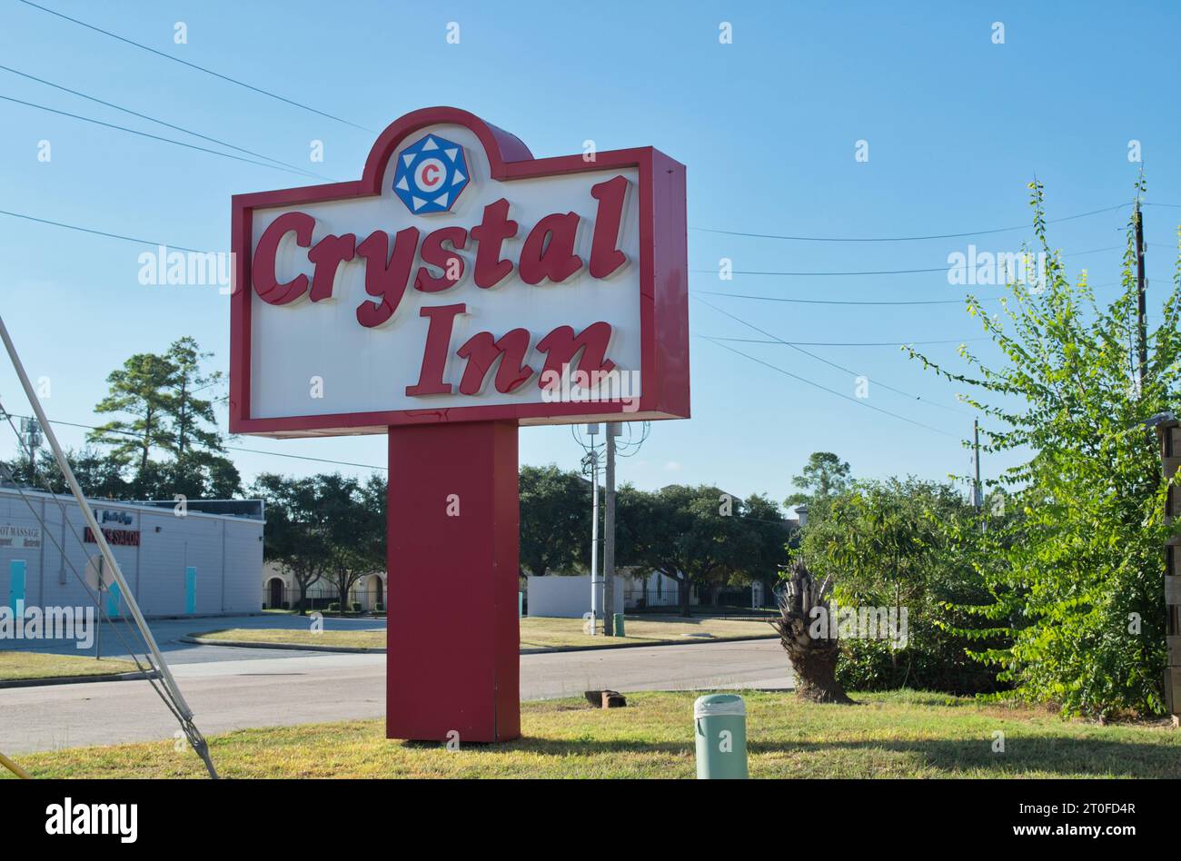 Houston, Texas USA 09-24-2023: Crystal Inn motel sign by the roadside in Houston, TX. Hotel business chain founded in Utah 1994. Stock Photo