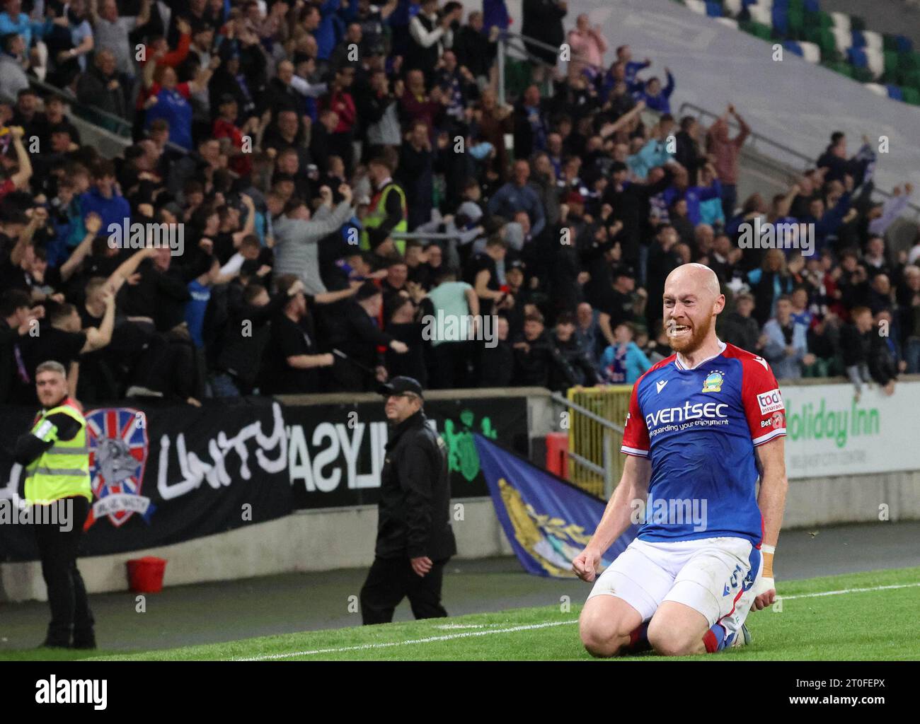 Windsor Park, Belfast, Northern Ireland, UK. 06th Oct 2023. Sports Direct Premiership – Linfield v Glentoran. Irish Premiership action from tonight's game in Belfast. (Linfield in blue). Chris Shields puts Linfield 1-0 ahead. Credit: CAZIMB/Alamy Live News. Stock Photo