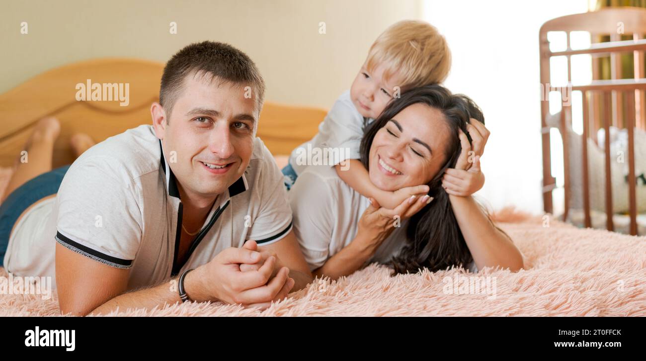 Mother son hugging on bed hi-res stock photography and images - Page 14 -  Alamy