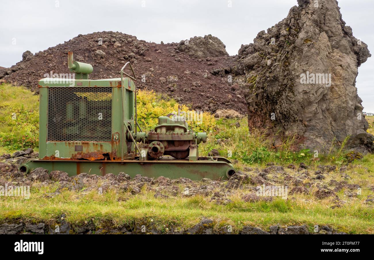 A waterpump that was used during the 1973 volcanic eruption that destroyed 417 houses in Heimaey to stop the lava closing the harbour, Iceland Stock Photo
