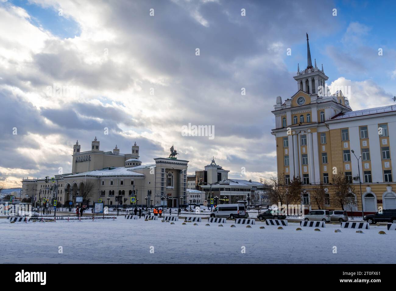 The theater and old Soviet residential building in the downtown of Ulan-Ude, Buryatiya, Russia, during the cloudy winter day. Stock Photo