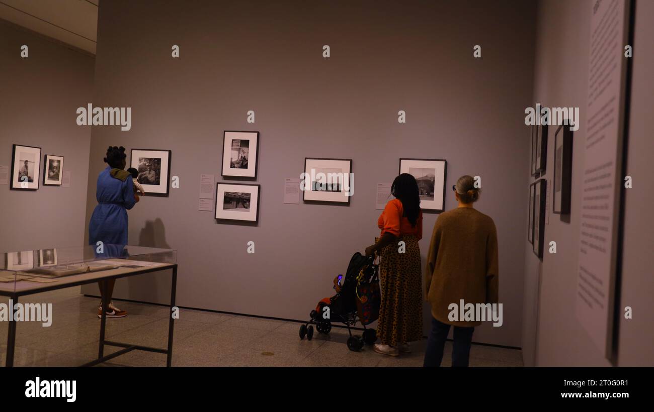Houston, Oct. 8. 7th Jan, 2024. People attend the preview of a photo exhibition titled Robert Frank and Todd Webb: Across America, 1955 at the Museum of Fine Arts, Houston, Texas, the United States, on Oct. 6. 2023. A total of 100 photographs chart the cross-country journeys of two photographers, who each captured singular views of America in the mid-20th century, during the exhibition here from Oct. 8, 2023 to Jan. 7, 2024. Credit: Xu Jianmei/Xinhua/Alamy Live News Stock Photo