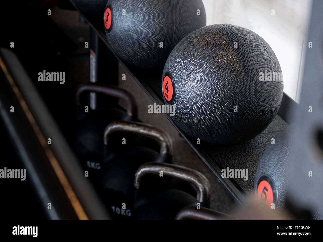 Fitness training with kettle bell in sport gym Stock Photo