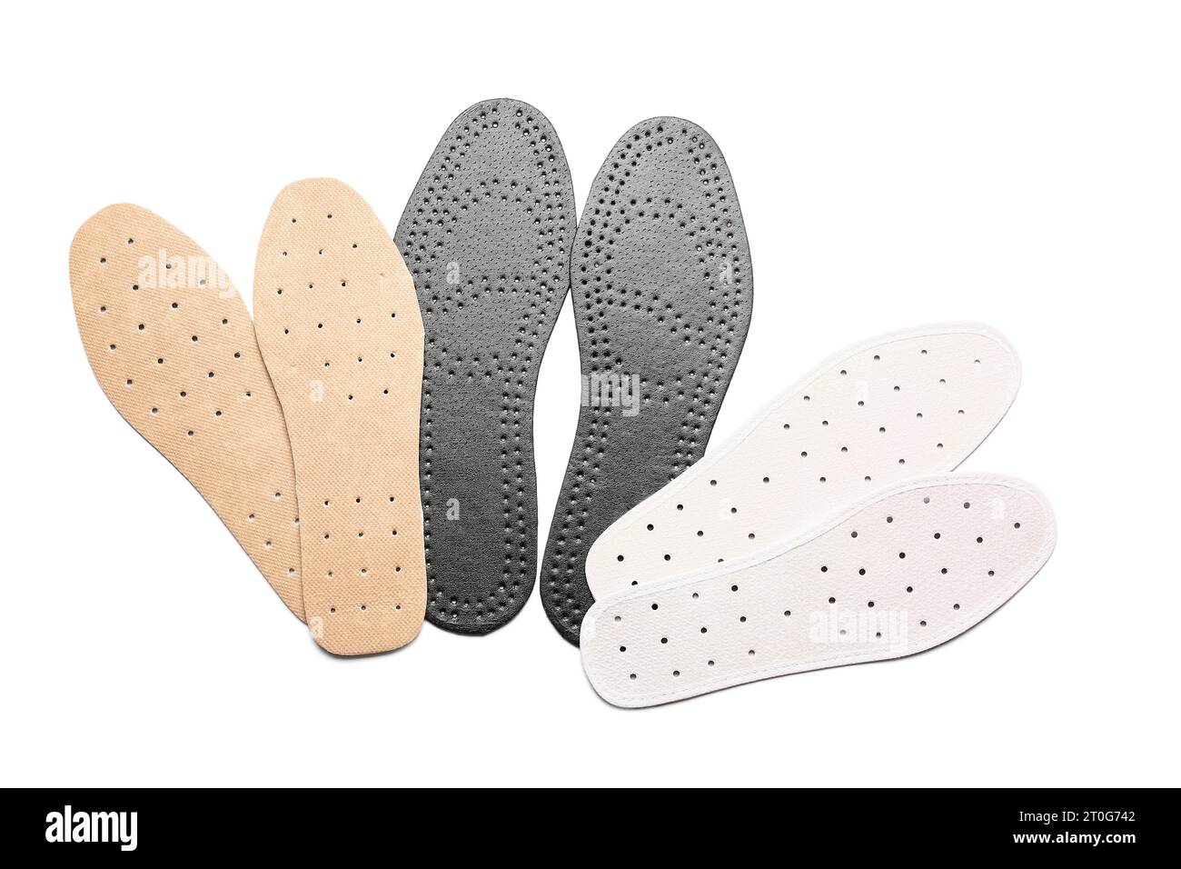 Set of different orthopedic insoles on white background Stock Photo - Alamy
