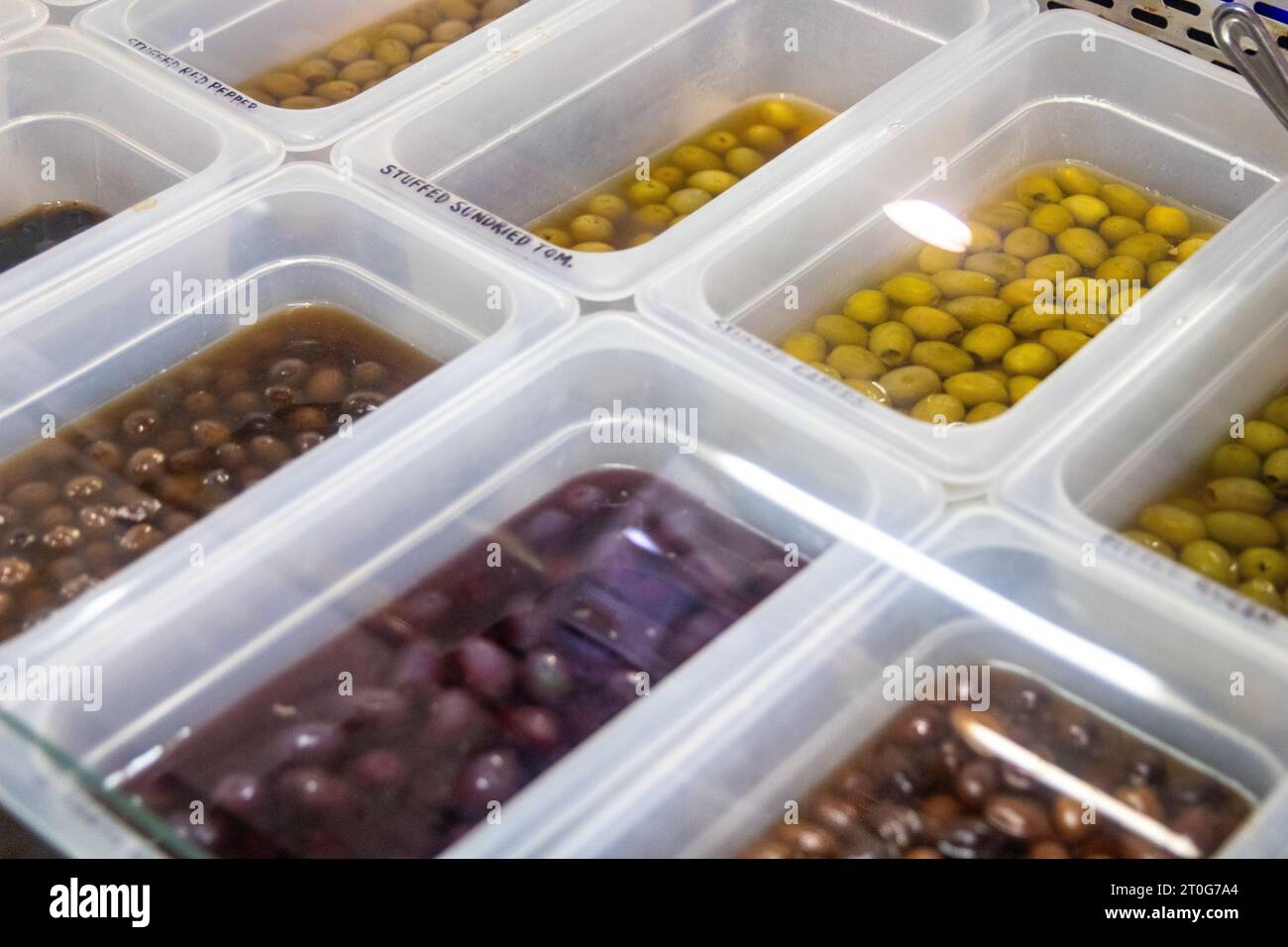 A Self Serve Olive Bar with different choices Stock Photo