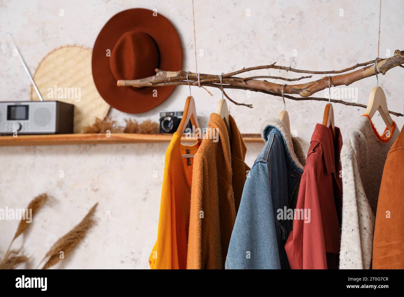 Coats hanging home hi-res stock photography and images - Alamy