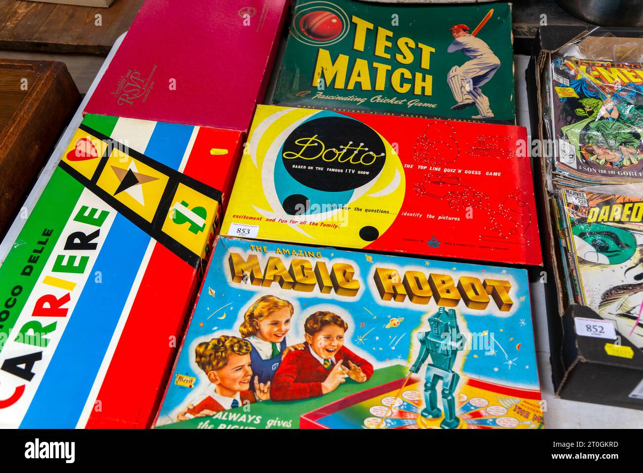 Vintage boxed children's board games and toys on display at auction room, UK Stock Photo