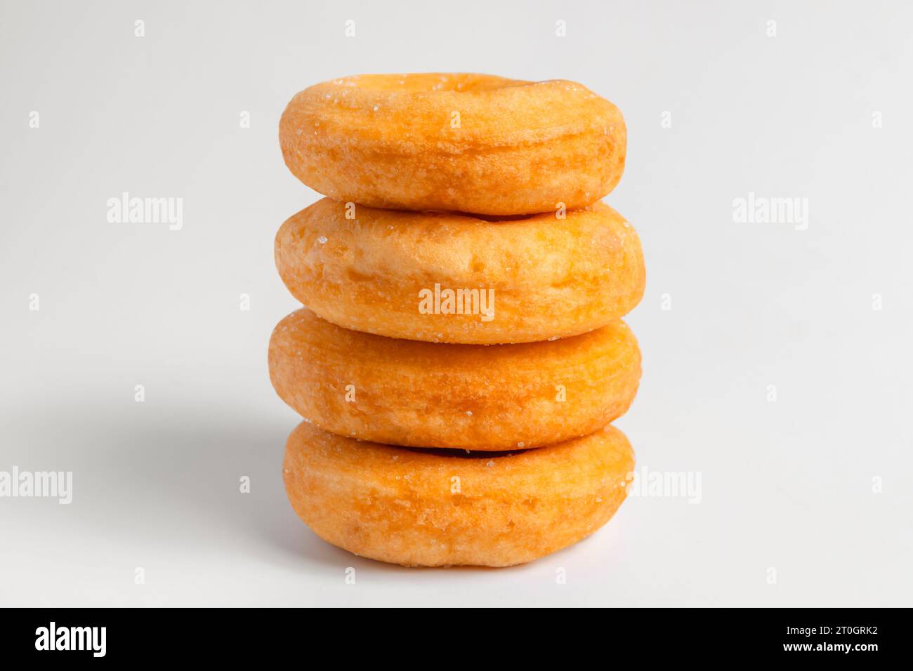 Donuts cake bakery sprinkled with sugar on white background Stock Photo