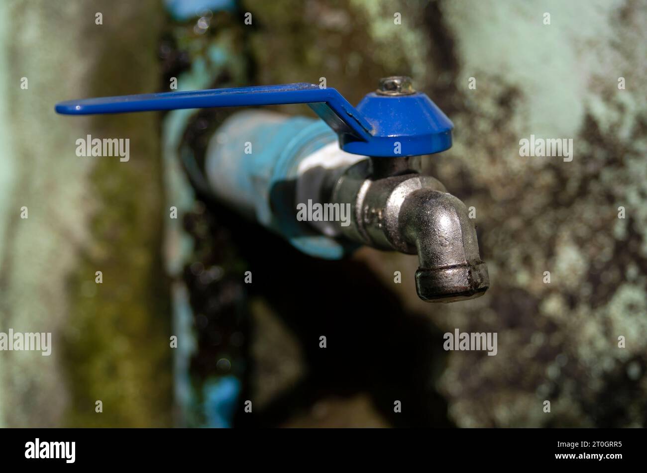 Wasting water water drop from water tap, Leaky or tap, water tap in