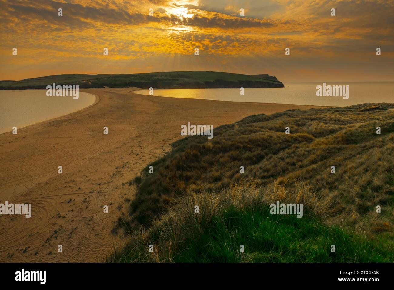 St Ninian's Beach is a large, natural sand causeway with sea on either side. It is located on the west coast of Shetland. Stock Photo