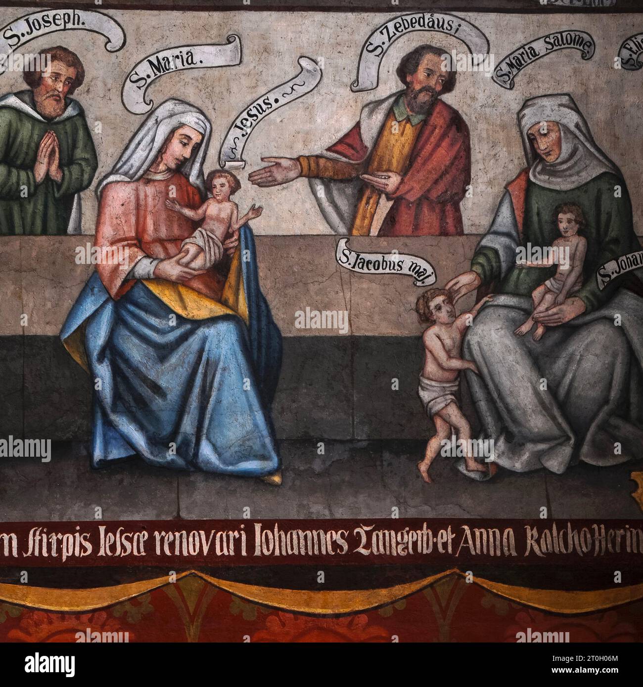 Detail of fresco, dating from the Late Gothic period and restored in the 1600s, in the north transept of the medieval Cathedral of Saint George in Limburg-an-der-Lahn, Hesse, Germany,  The Blessed Virgin Mary with the Infant Jesus is depicted with other saints.  The complete mural shows a Tree of Jesse (genealogy of Christ) above the saints. Stock Photo