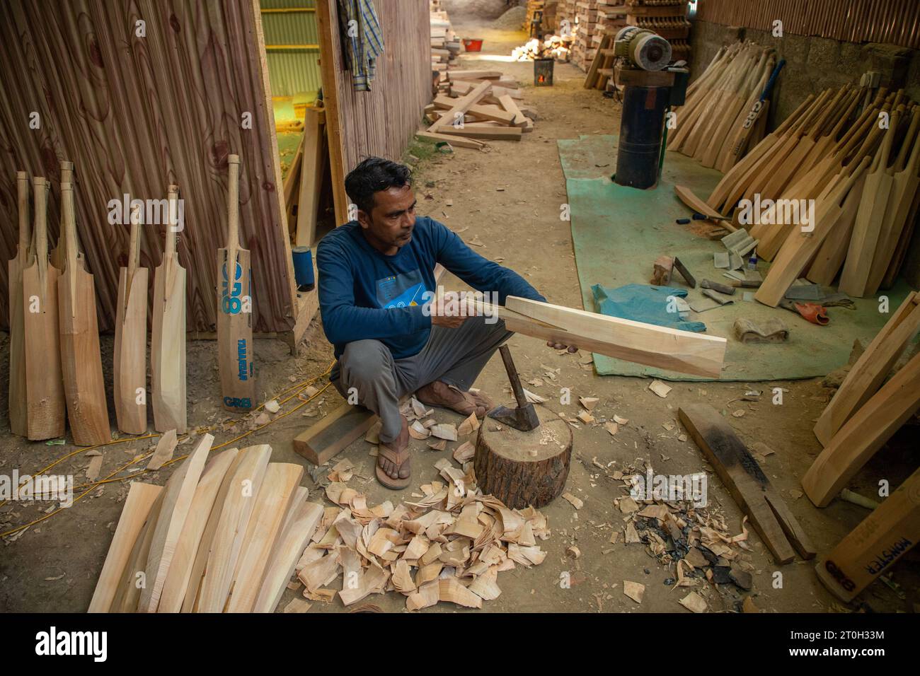 kashmir-india-2nd-oct-2023-a-worker-shapes-a-kashmiri-willow-wood