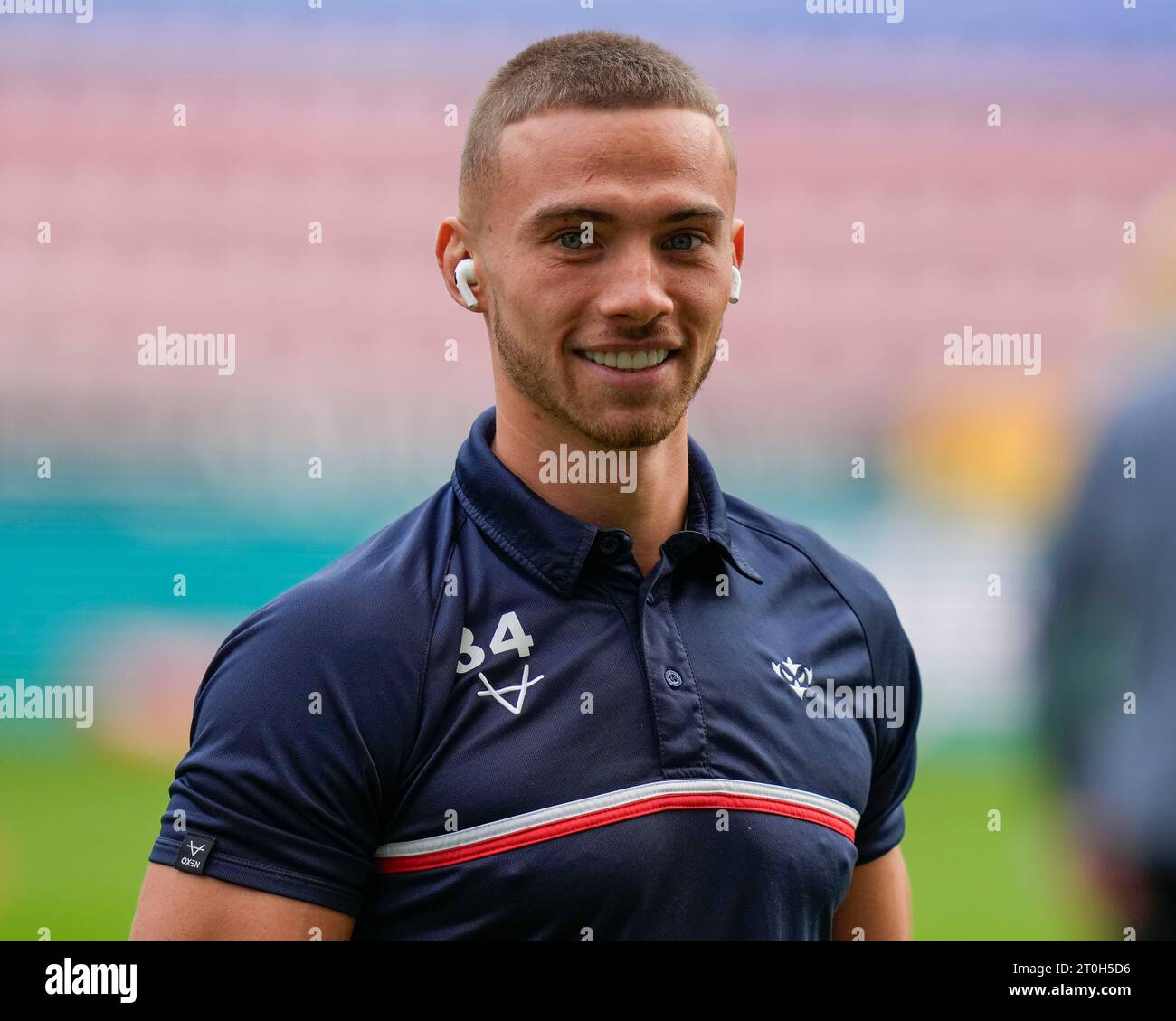 Jack Walker 34 of Hull KR inspects the pitch before the Betfred Super