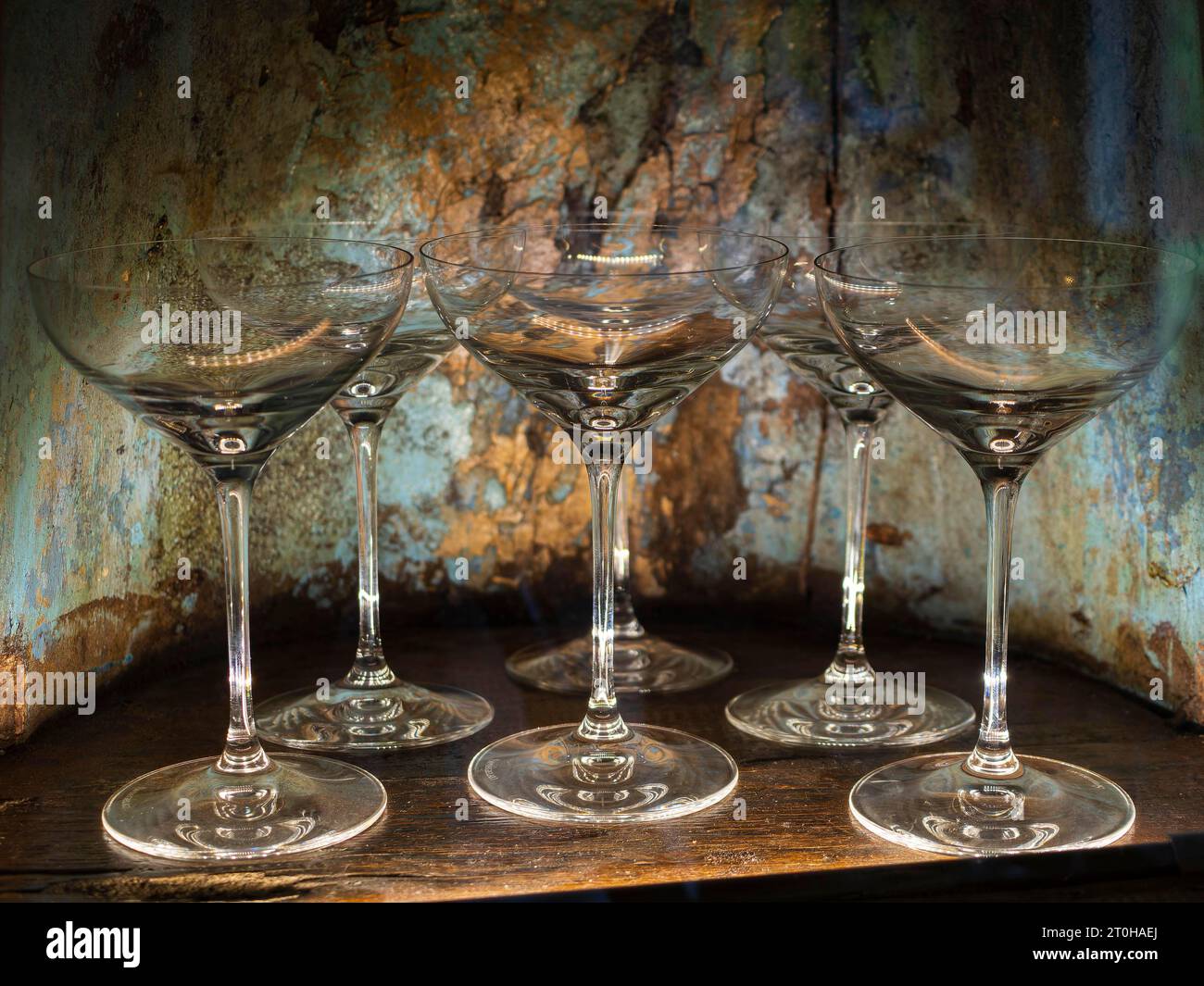 https://c8.alamy.com/comp/2T0HAEJ/lead-crystal-glasses-wine-glasses-champagne-glasses-colourful-in-old-display-case-2T0HAEJ.jpg