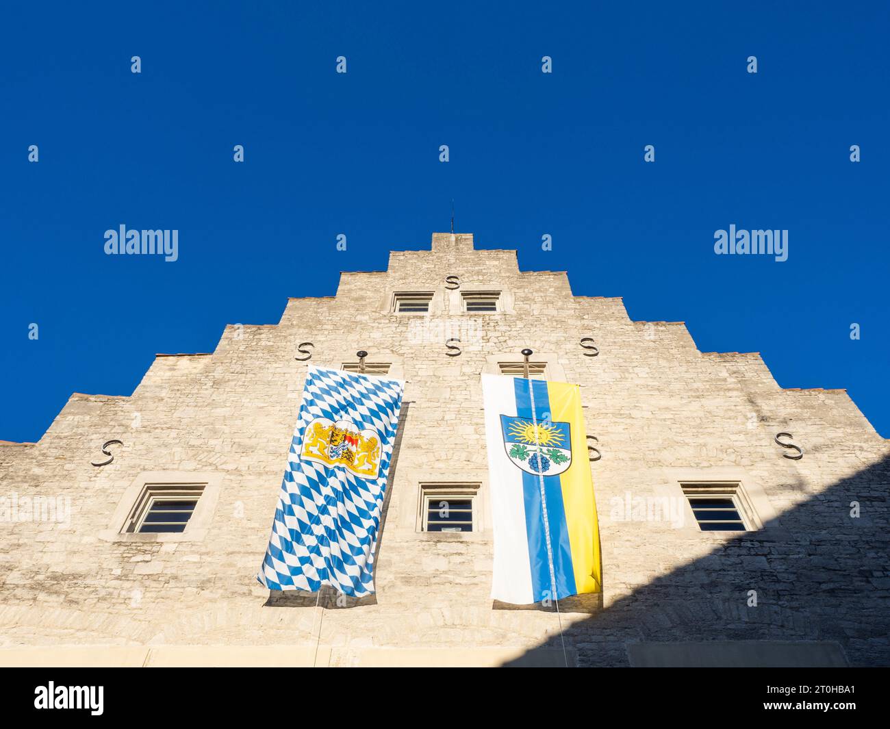 Flags hanging from the town hall, Sommerhausen, Wuerzburg County, Lower Franconia, Germany Stock Photo