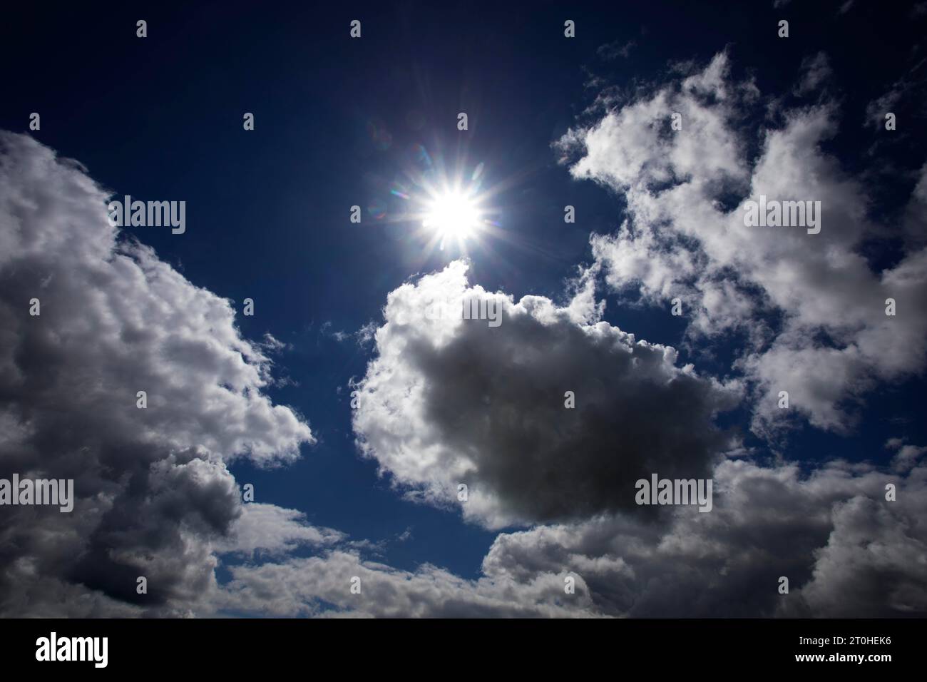 Dramatic cloudscape with (cumulus) clouds and sunrays, thunderclouds, rain clouds, Austria Stock Photo