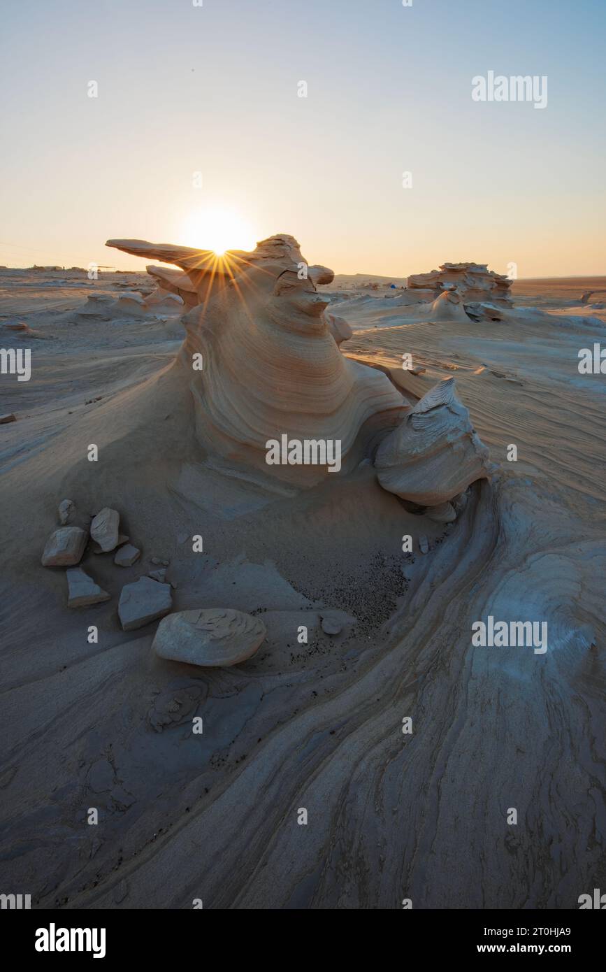 Desert eroded rock pattern with clear sky during the hot sun. Desert ...