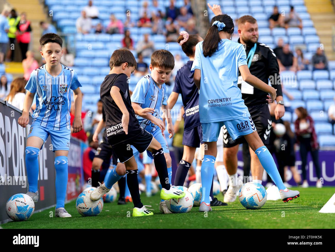 Coventry City match day mascots warm up on the pitch ahead of the Sky Bet Championship match at the Coventry Building Society Arena, Coventry. Picture date: Saturday October 7, 2023. Stock Photo