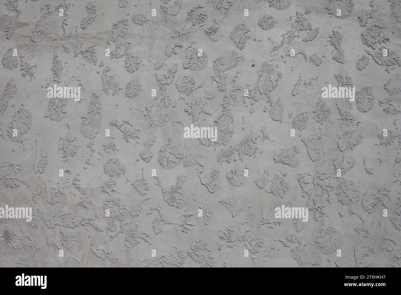 Gray concrete on a textured mesh. Stock Photo