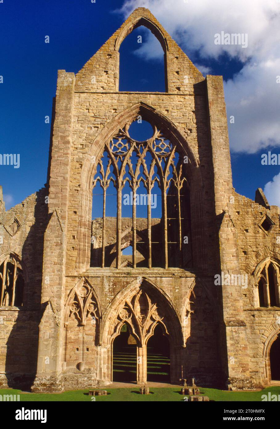 The west front of Tintern Abbey Cistercian monastic church, Monmouthshire, Wales, UK. Founded 1131 by Walter de Clare, the Norman lord of Chepstow. Stock Photo