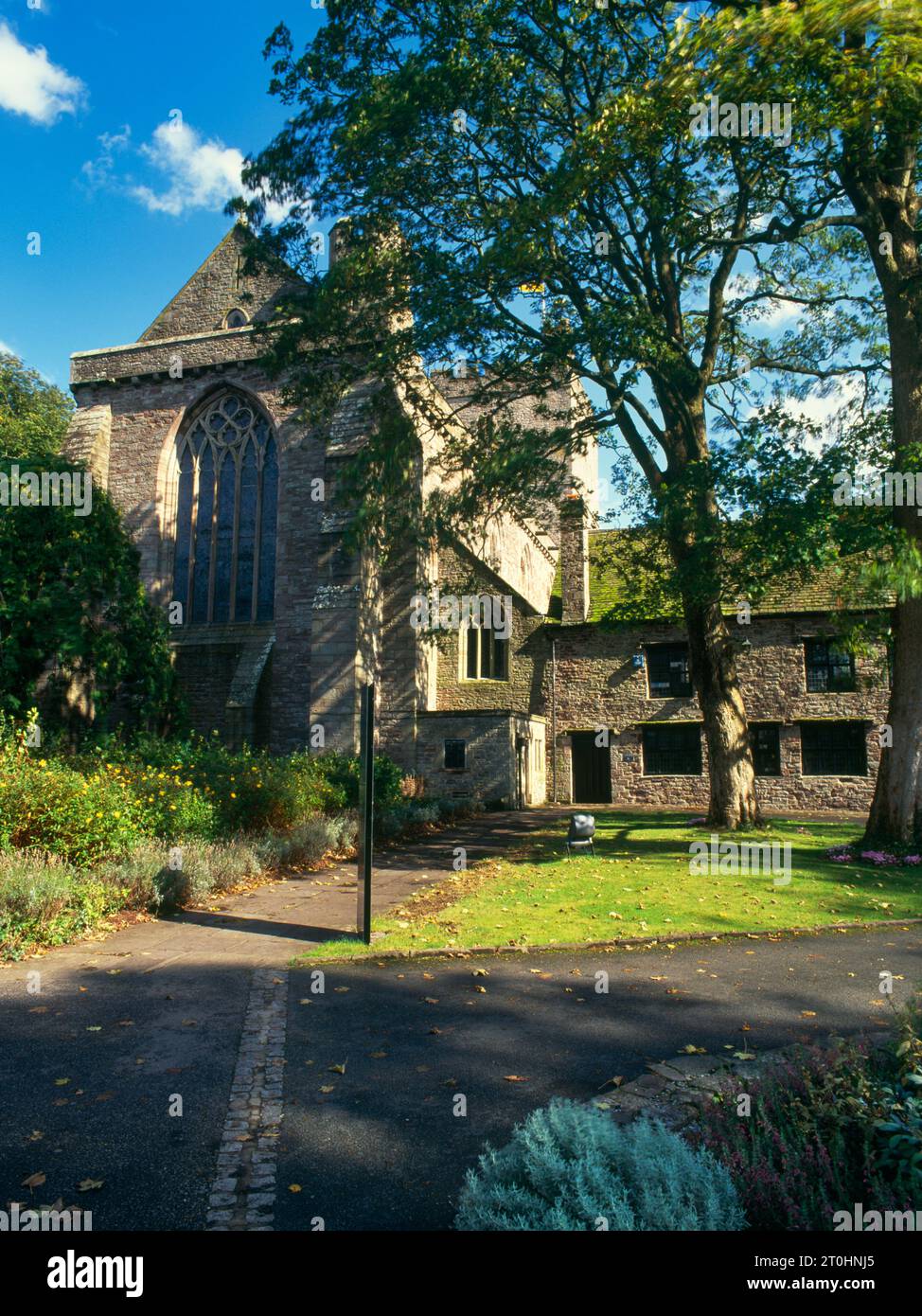 Cathedral Church of St John the Evangelist, Brecon, Powys, Wales, UK, looking E from the Pilgrims Tea Room herb garden. A Norman Benedictine priory. Stock Photo