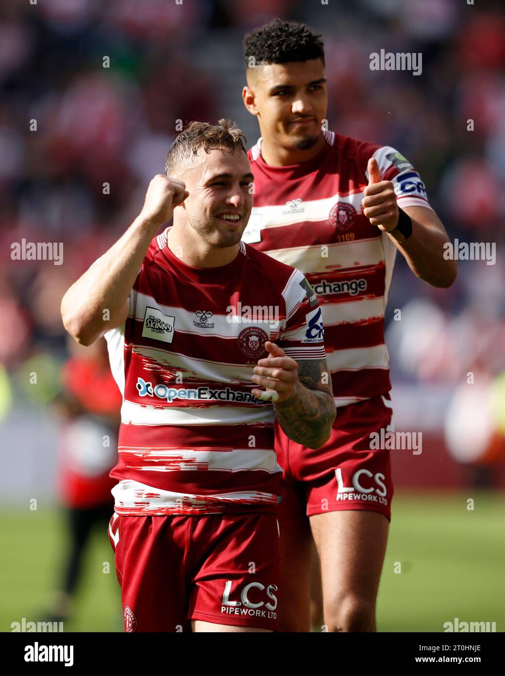 Wigan Warriors' Sam Powell (left) celebrates following the Betfred ...