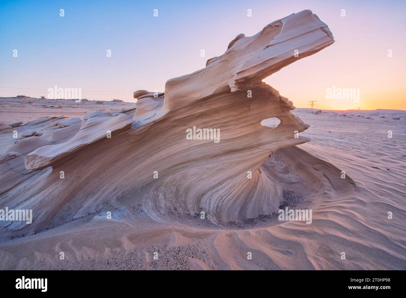 Desert eroded rock pattern with clear sky during the sunset. Desert ...