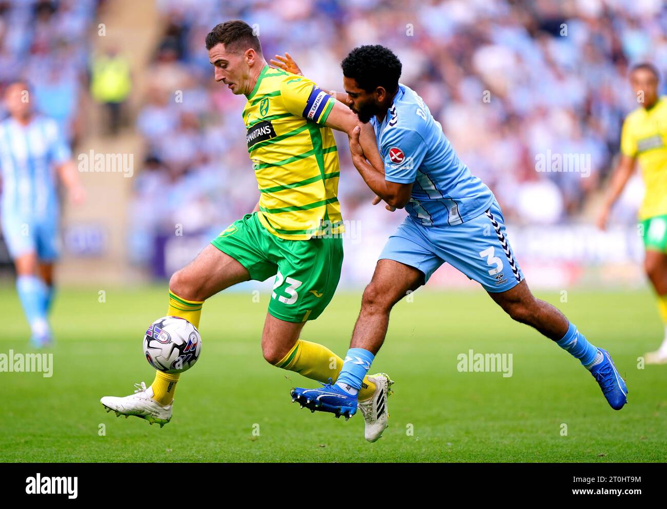 Norwich City's Kenny McLean (left) and Coventry City's Jay Dasilva battle for the ball during the Sky Bet Championship match at the Coventry Building Society Arena, Coventry. Picture date: Saturday October 7, 2023. Stock Photo