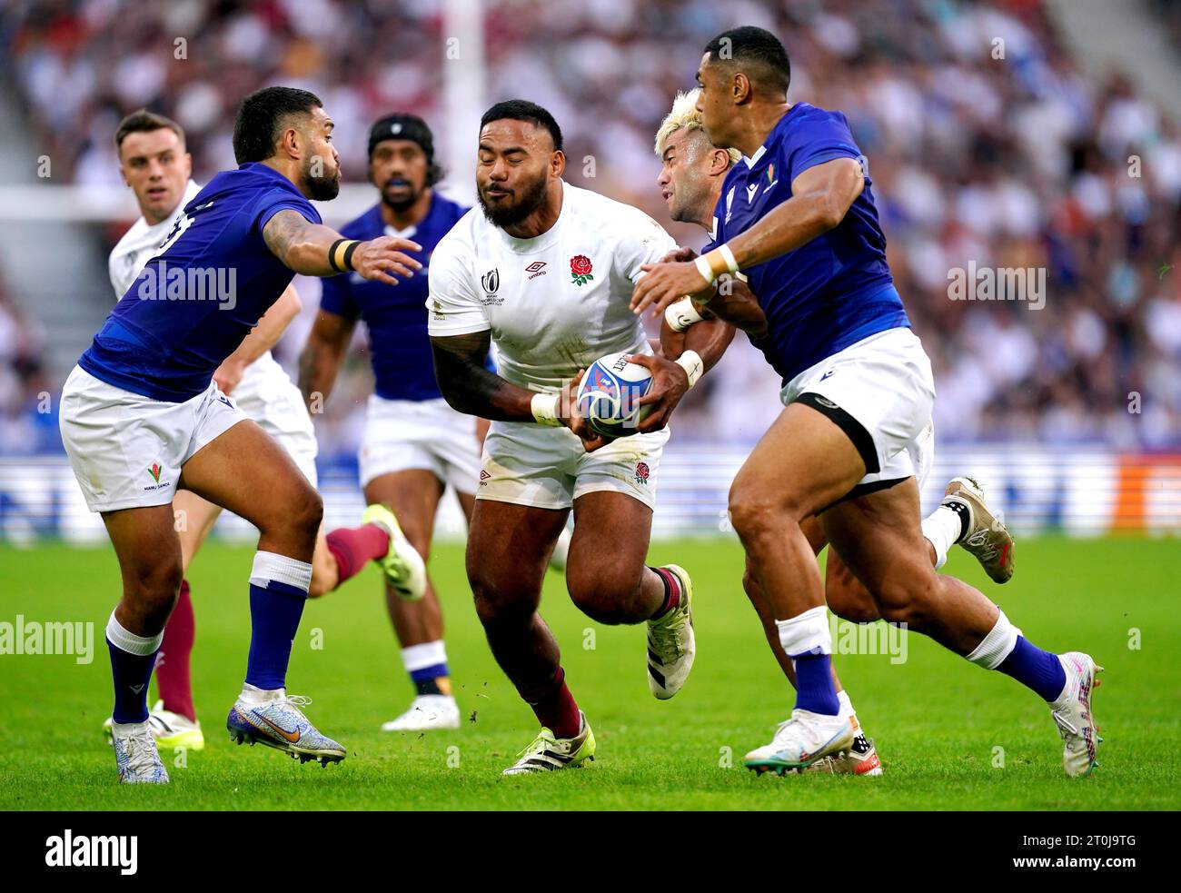 England's Manu Tuilagi is tackled by Samoa's Duncan Paia'aua during the Rugby World Cup 2023, Pool D match at Stade Pierre Mauroy in Lille, France. Picture date: Saturday October 7, 2023. Stock Photo