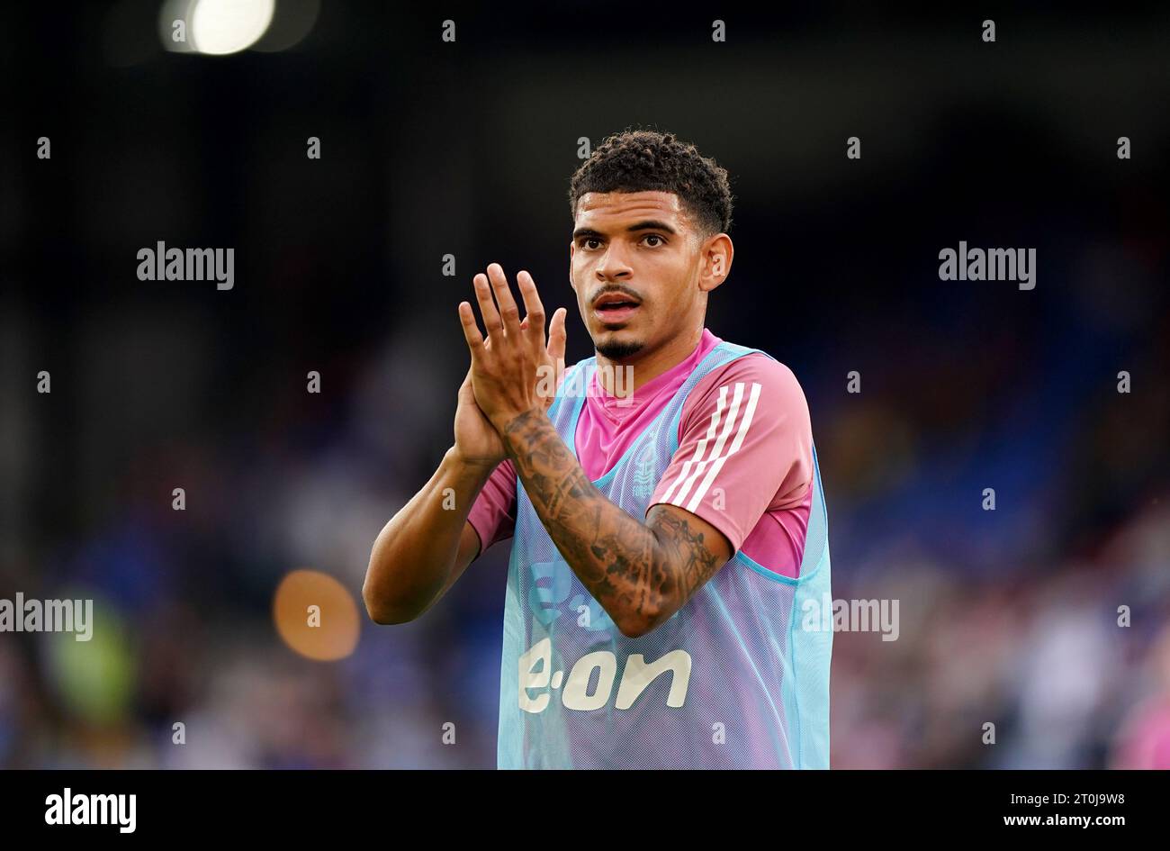 Nottingham Forest's GibbsWhite applauds the away fan during the