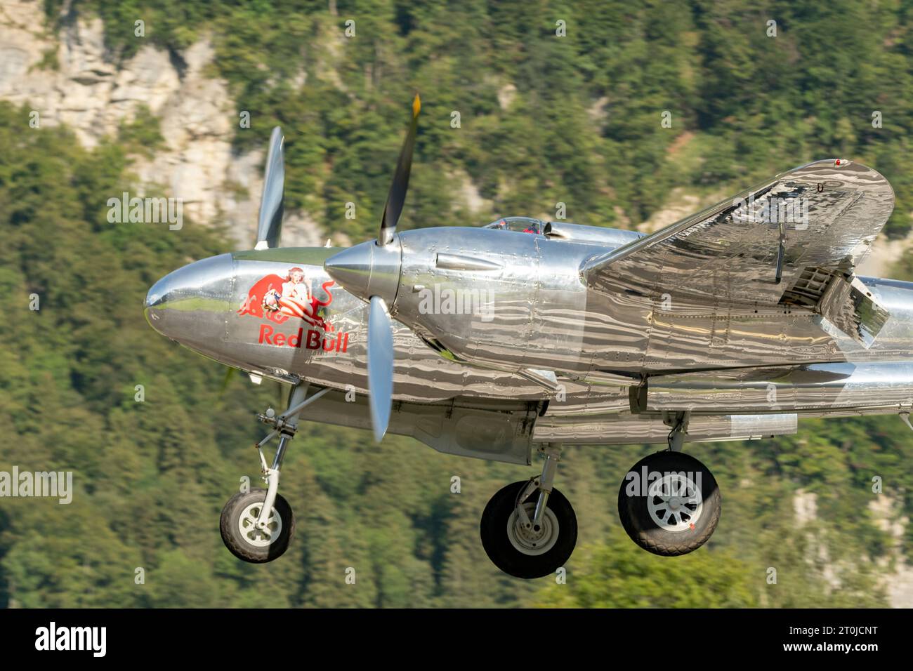 Mollis, Switzerland, August 18, 2023 N-25Y Lockheed P-38L Lightning aircraft is taking off from runway 19 Stock Photo