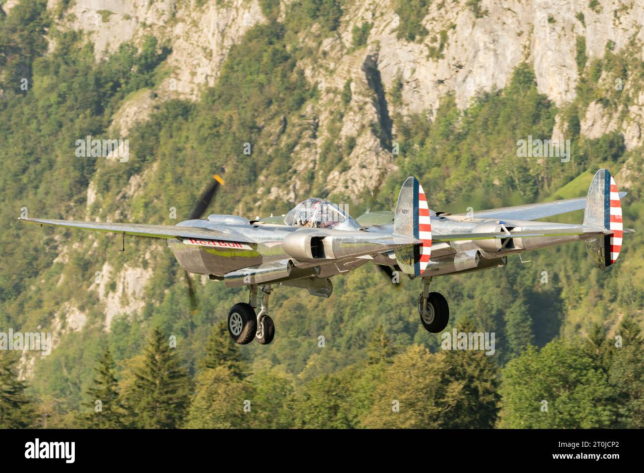 Mollis, Switzerland, August 18, 2023 N-25Y Lockheed P-38L Lightning aircraft is taking off from runway 19 Stock Photo