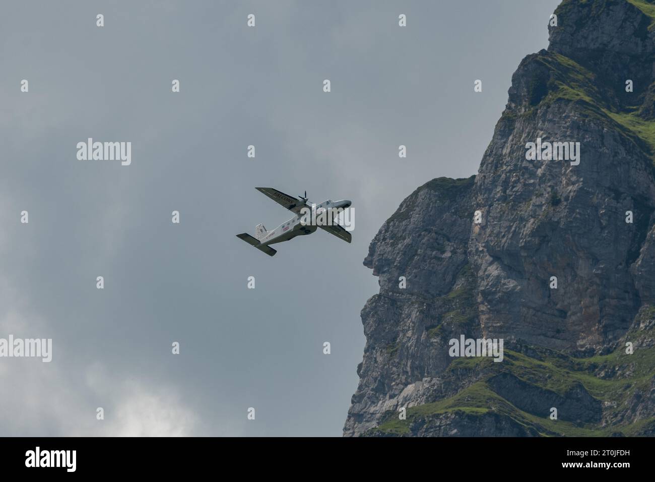 Mollis, Switzerland, August 18, 2023 C-FPSH Dornier 228.202 aircraft during an air show in the alps Stock Photo