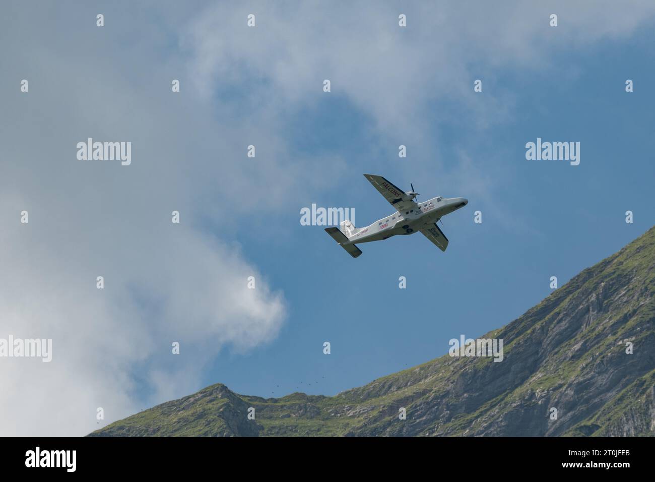 Mollis, Switzerland, August 18, 2023 C-FPSH Dornier 228.202 aircraft during an air show in the alps Stock Photo