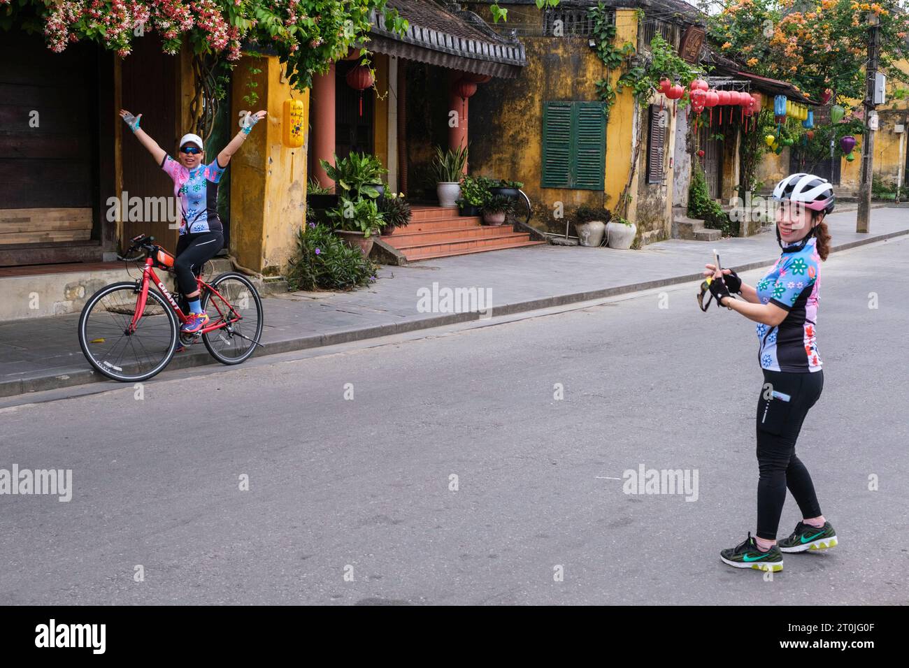 Hoi An, Vietnam. Vietnamese Women Posing for Photo. Stock Photo