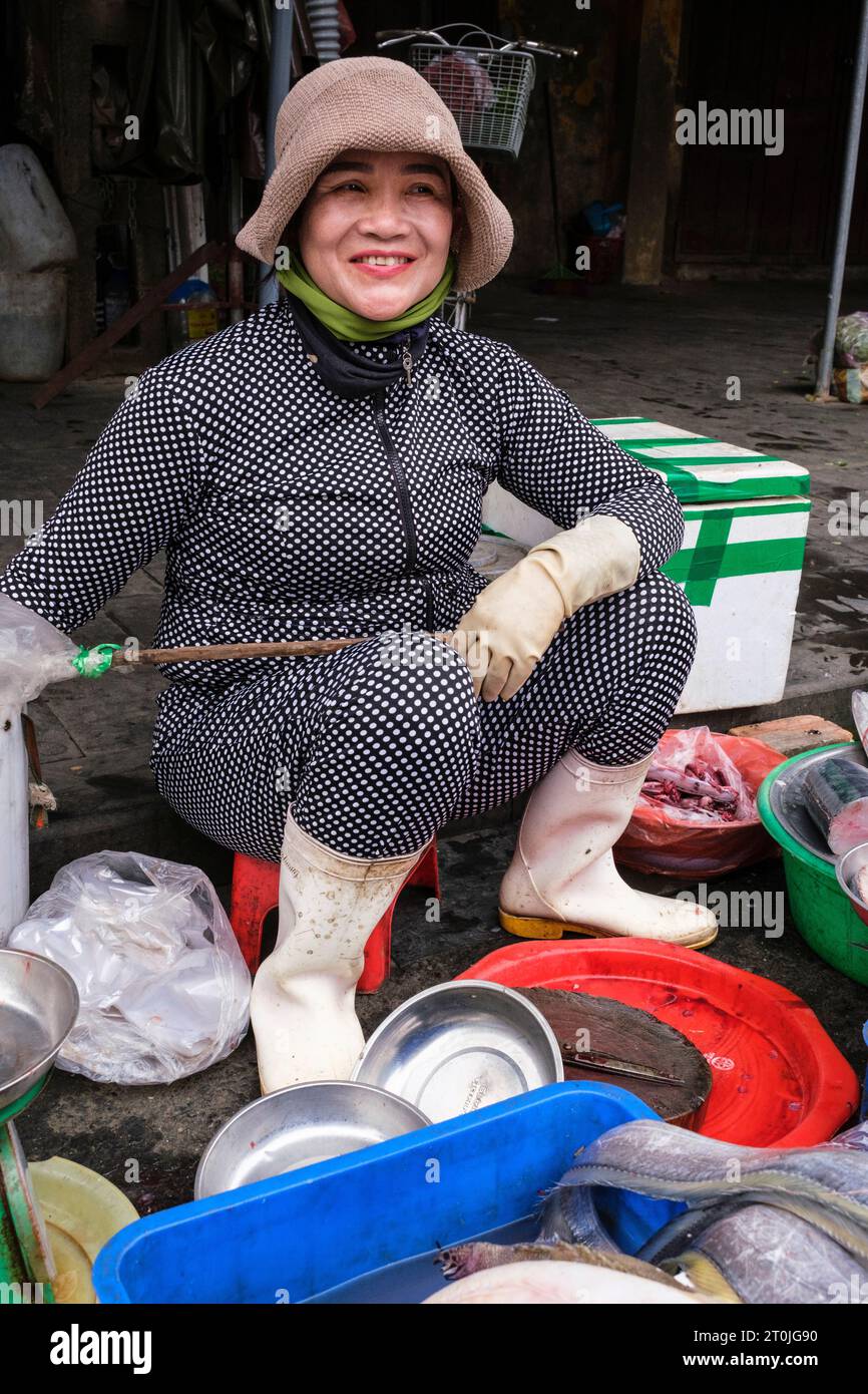 Hoi An, Vietnam. Woman Selling Fish in the Market. Stock Photo