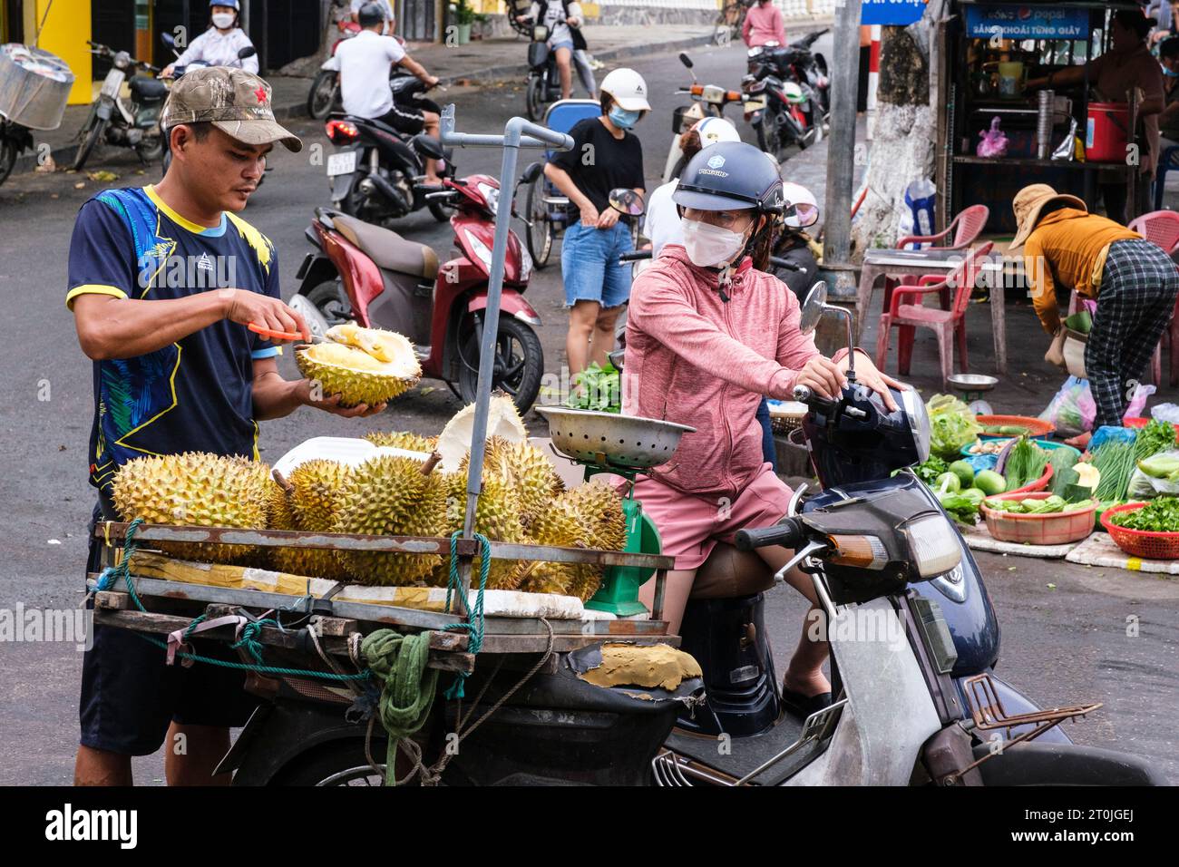 Hoi An, Vietnam. Vendor Selling Durian in the Market. Stock Photo