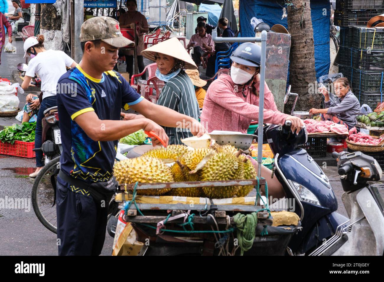Hoi An, Vietnam. Vendor Selling Durian in the Market. Stock Photo
