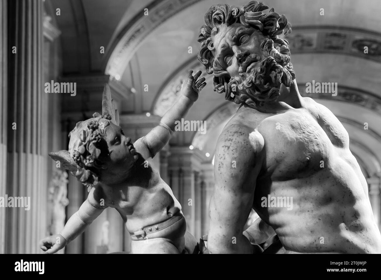 Eros teasing Centaur, sculpture at Louvre Museum Stock Photo