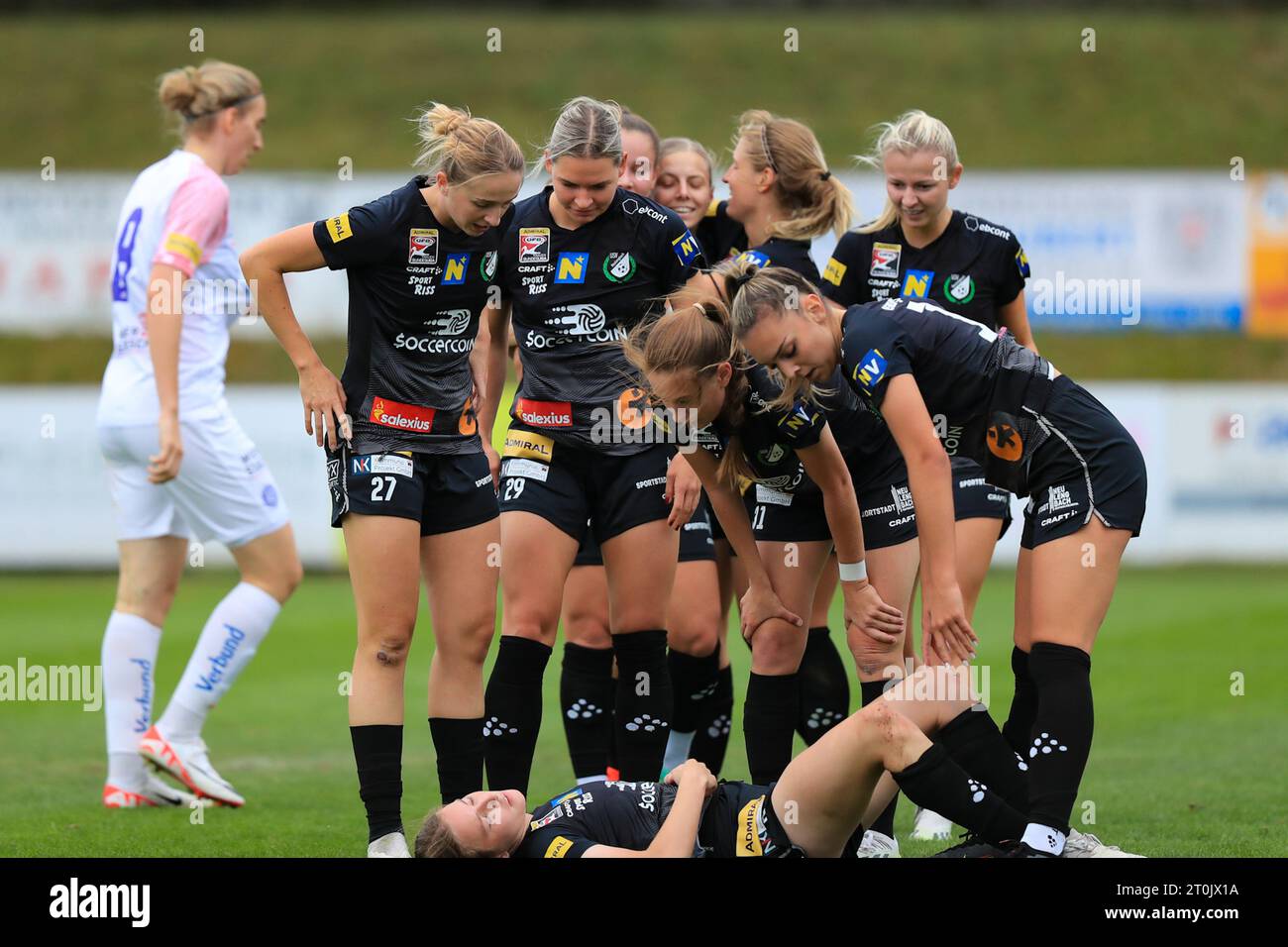 Neulengbach players checking on their injured colleague during the Admiral Frauen Bundesliga match Neulengbach vs Austria Wien at Wienerwald Stadion (Tom Seiss/ SPP) Credit: SPP Sport Press Photo. /Alamy Live News Stock Photo