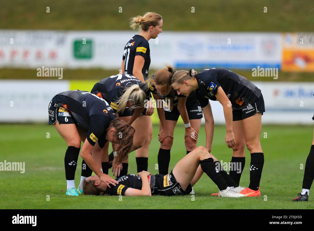 Neulengbach players checking on their injured colleague during the Admiral Frauen Bundesliga match Neulengbach vs Austria Wien at Wienerwald Stadion (Tom Seiss/ SPP) Credit: SPP Sport Press Photo. /Alamy Live News Stock Photo