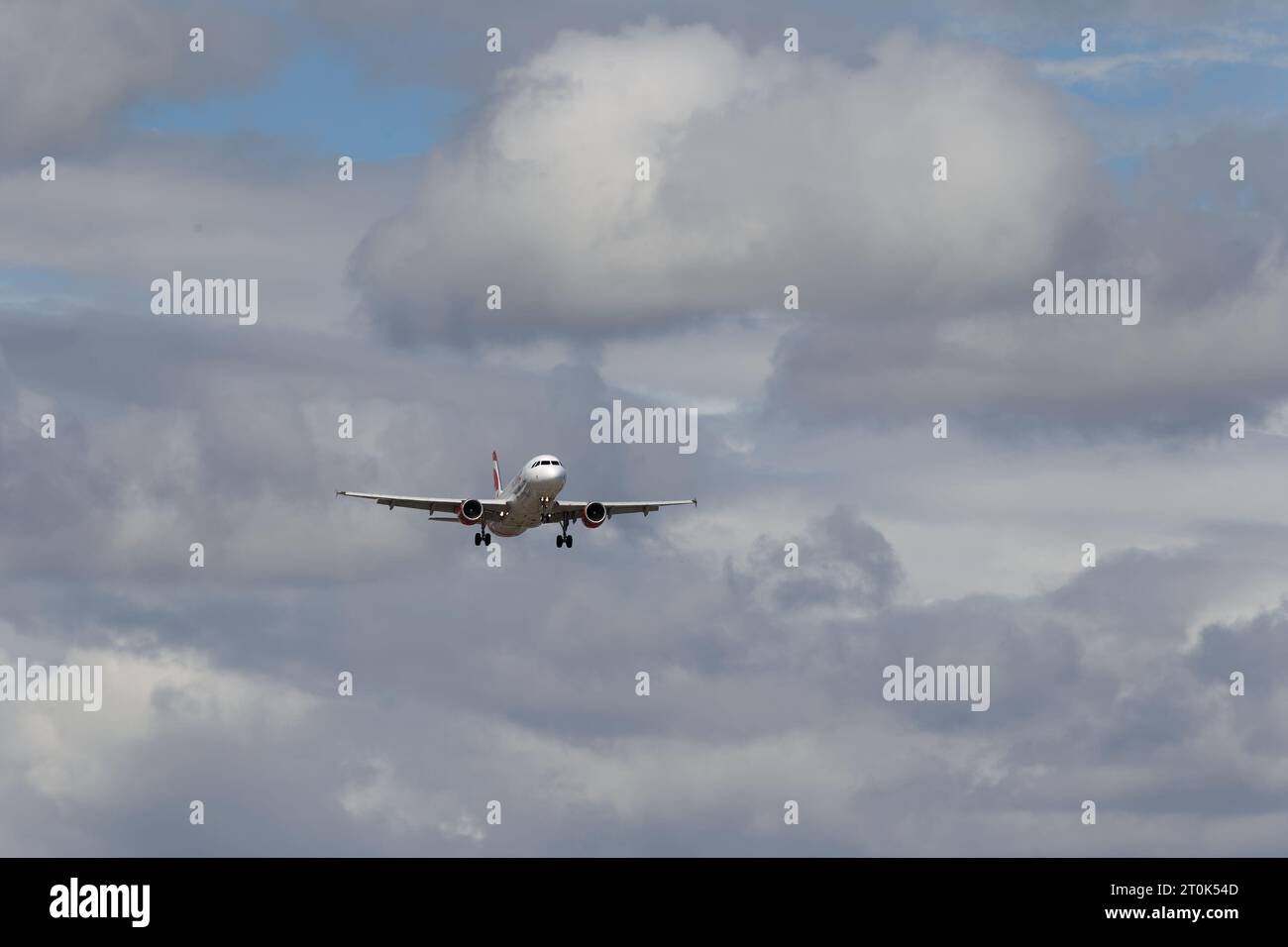 Air Canada Rouge Airbus descends to land at the Montréal-Pierre Elliott Trudeau International Airport. Montreal,Quebec,Canada Stock Photo