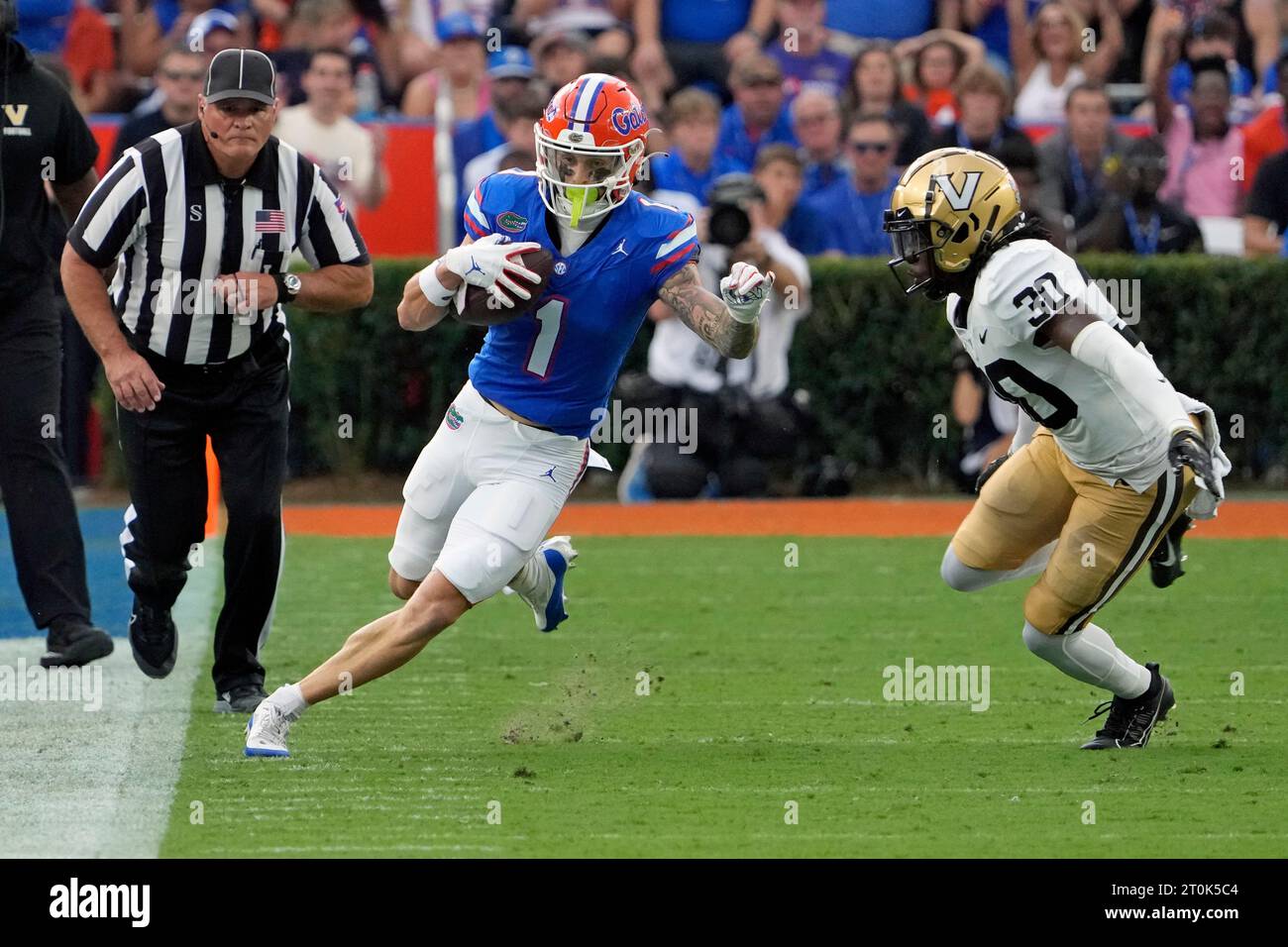 Florida wide receiver Ricky Pearsall (1) tires to get past Vanderbilt