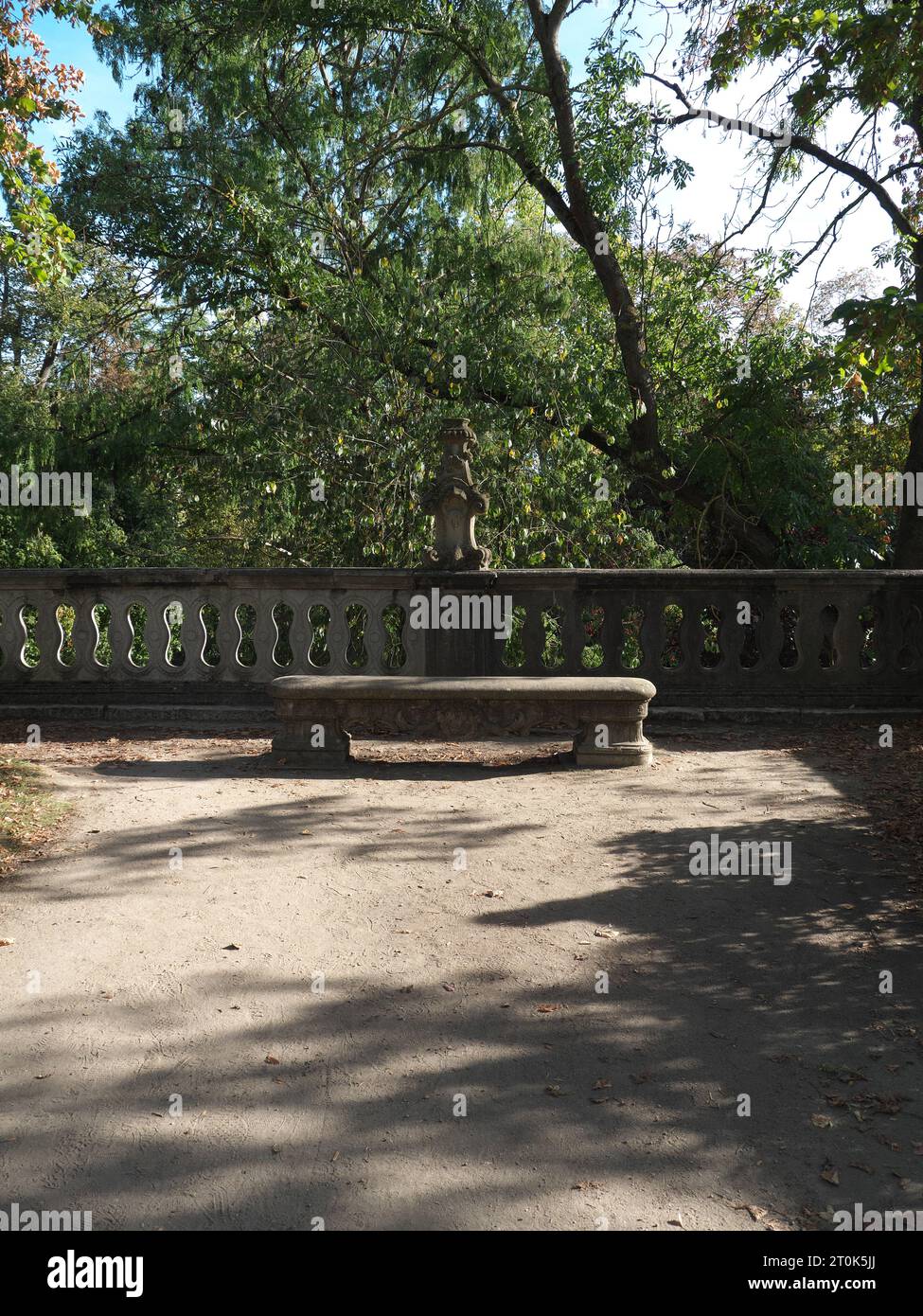 Bench in front of a balustrade of the court garden of the Würzburg Residence Stock Photo